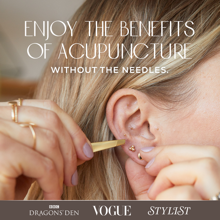 Person performing ear candling on herself with text about acupuncture alternatives.